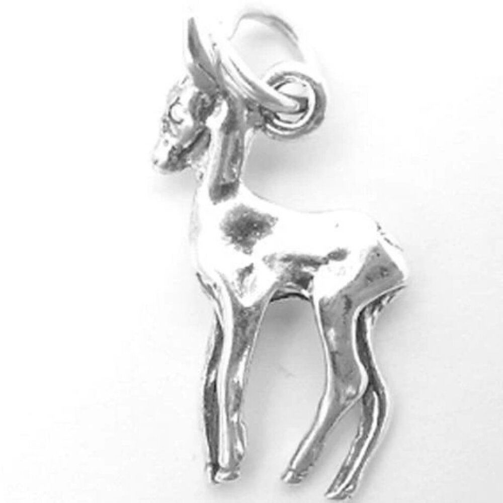 DEER STANDING STILL CHARM IN STERLING SILVER.
